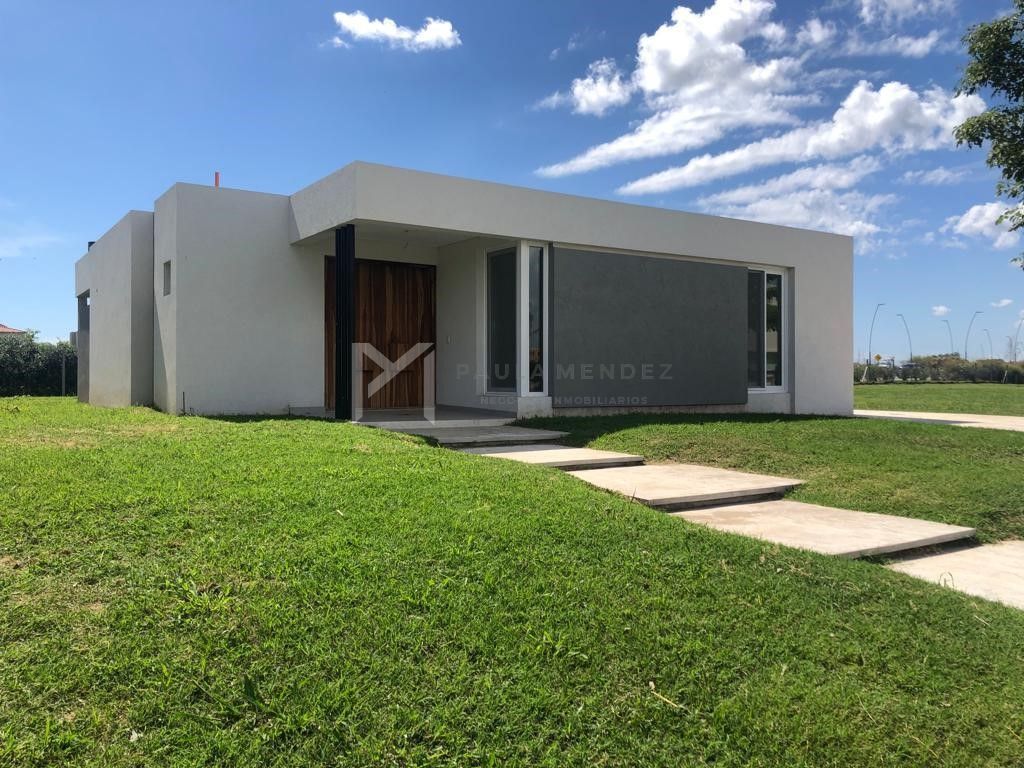 #3225380 | Venta | Casa | Puertos del Lago (Paula Mendez Negocios Inmobiliarios)